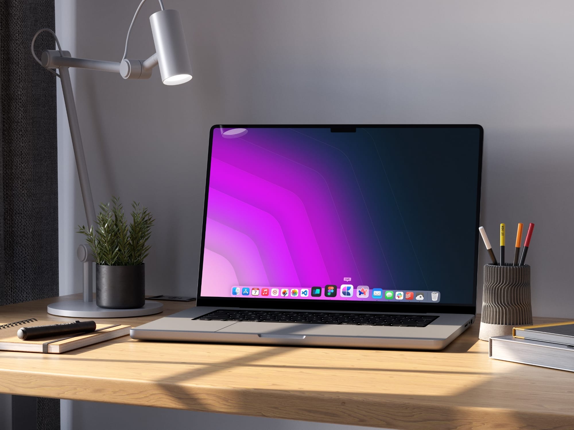 MacBook Pro on a wooden desk showcasing the macOS dock with several app icons